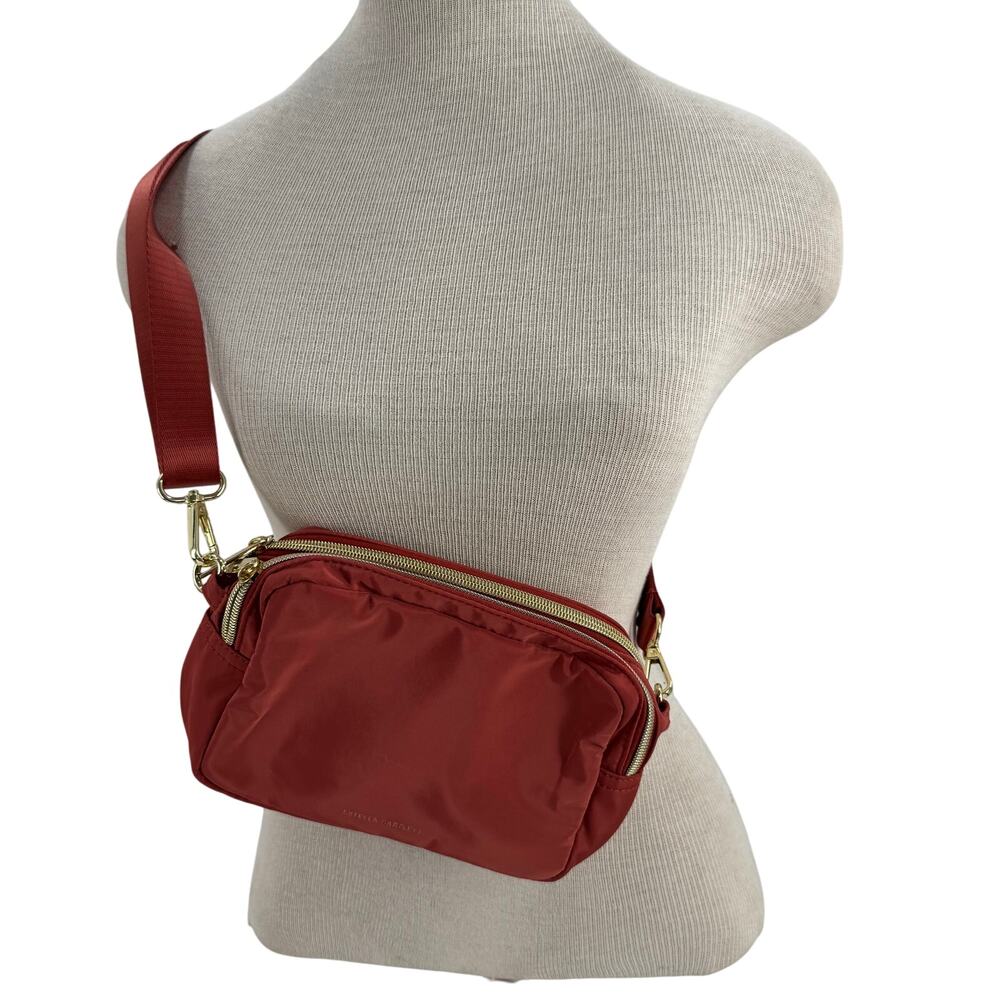 Estella Bartlett orange belt bag